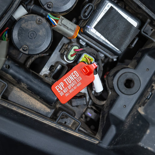 ECU Warning Zip Tie attached to diagnostic port